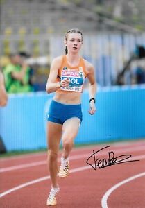 femke bol on her way to winning a medal during the race signed 10x8 photo
