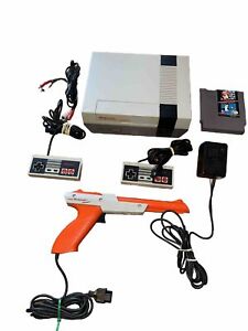 Original NES Console, 2 Controllers, Game,Zapper Repolished Pins Authentic