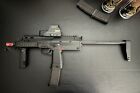 H&K Gas Blowback Airsoft MP7, 2 Magazines, 2 new gas cans, and scope included