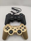 Lot of  2 PS3 Dual shock Controllers Gold & Black With charging Cord TESTED