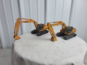 Two 1/50 Ertl Case Toy Excavators 9030B And CX210