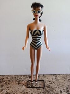 New ListingVtg 1960's #5 Dark haired ponytail Barbie with original swimsuit, glasses, shoes