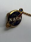 Early 1980s NASA 25 Years Service Tie Pin in 10K Gold. Pre-owned.