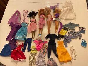 New ListingLot of 4 vintage Barbie dolls 1970s 1980s Clothed. One Is African American.