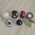 Lot of 7 statement fashion women rings. Gold tone & Silver tone, some stretch.