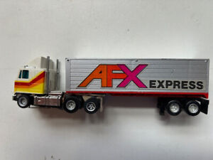 AURORA AFX GMC Cabover Yellow/ Orange Stripe / AFX Express Trailer