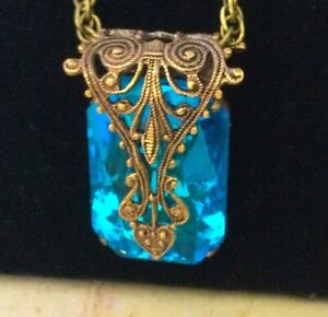 Vintage Necklace Art Nouveau Brass Filigree Aqua Blue Rhinestone Pendant