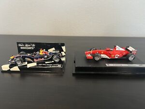 1/43 scale Formula 1 Ferrari And Red Bull diecast cars