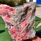208G  Mineral specimens of natural rhodochrosite coexisting with purple fluorite