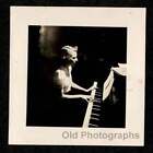 New ListingDARK ROOM/STAGE? WOMAN IN LIGHT PLAYING PIANO OLD/VINTAGE PHOTO SNAPSHOT- M216