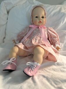 Madame Alexander 18” baby doll with complete wardrobe of  clothes