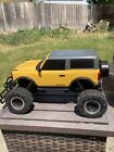 New Bright Ford Bronco 1:8 scale Yellow RC (CAR ONLY) PARTS OR REPAIR Untested