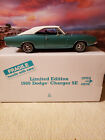 1/24 scale 1969 Dodge Charger SE. Diecast Danbury Mint model in Turquoise.