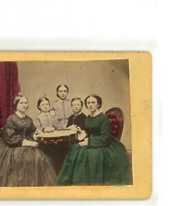 New ListingWomen and Children Around Table Hand Tinted Stereoview