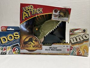 ​includes UNO Attack Jurassic World Domination Card Game (distress pkg) --new