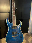 ESP LTD Deluxe MH-1000 Electric Guitar Flame Maple, With Rock Hard See-thru Blue