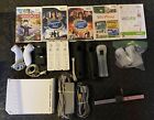 Nintendo Wii Bundle - Console, 5 Games, 3 Controllers with Nunchuk & Motion Plus