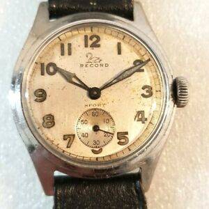 Record Caliber 107 at the back marked R 8126 watch w/ sub second @ 6 . Runs.