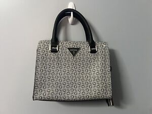 Women’s Handbag w/coin Purse NEW: Guess. Purse without Handle is 8 1/2” X 10”.