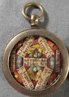 ANTIQUE LOCKET CASE WITH THE RELICS OF 12 FRANCISCAN SAINTS -