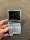 New ListingNintendo Game Boy Advance SP AGS 101 Handheld, Pearl Blue Pre-Owned Tested