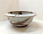 Unique Handmade Stoneware  bowl with lip. Gray with brown