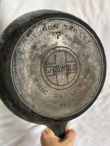 GRISWOLD 701 CAST IRON SKILLET SITS FLAT USED REGULARLY NEEDS CLEANED