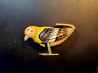 Vintage tin yellow wind-up pecking bird made in U.S. Zone Germany after WWII