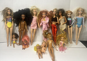 Huge Lot Of 14 Barbie/kids/dolls