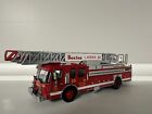 Code 3 Boston Fire Dept E-One Ladder 25, 1:64 Scale