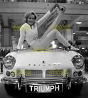 Photo - Janine Gray poses with Triumph Spitfire, Earls Court Motor Show, 1962