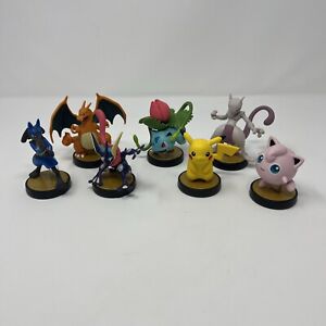 New ListingLot of 7 Pokemon Nintendo Amiibo Smash Bros Charizard Jigglypuff Lucario Pikachu