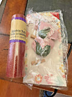 A Roll of Red Sparkle Tulle 6 inches by 3 yards and pack of pink burlap flowers