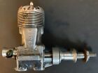 Collectible McCoy .48 model engine w/gas tank & propeller -engine does turn over
