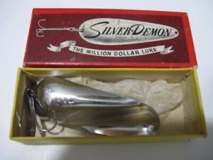 vintage Silver Demon fishing box with lure