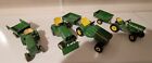 4 John Deere toy mowing tractors and trailers