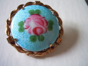 Vintage blue guilloche cabbage rose brooch with gold tone rope frame