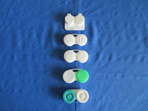 Lot 5 Contact Lens Cases. White, Green, & Clear Plastic. Have been washed clean.
