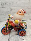 Vtg Antique Litho Tin Wind Up Toy of Celluloid Santa on Tricycle Korea Works