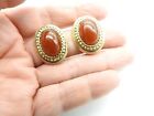 Amber Lucite Oval Textured Gold Tone Metal Clip On Earrings Vintage