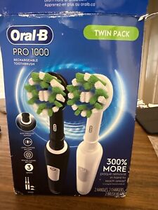 TWIN PACK Black & White Oral-B Pro 1000 Rechargeable Toothbrushes OPEN BOX USED