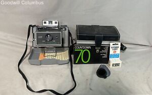 New ListingPolaroid Countdown 70 Vintage Camera w/ Case & Accessories
