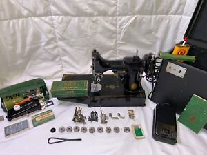 Singer Portable sewing machine 221-1 with pedal and complete buttonholer