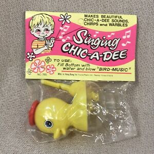 Singing Chic A Dee Plastic Bird Water Whistle Hong Kong NOS NIP Yellow or Red