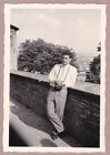 Vintage Snapshot Photograph Handsome Man Leaning On Wall Camera Around Neck