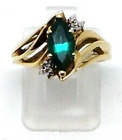 14k Yellow Gold Ladies Ring with Green Marquise Birthstone and 2 Clear CZ's
