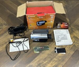 New ListingCanon ES75  Camcorder With Box, Strap, Manual, Tape, Power And Video Cord