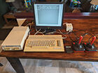 Working commodore 64c computer with 1541c disk drive, joysticks and games