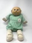 New ListingCabbage Patch Boy Baby Doll Vintage 1984 with no Hair Wearing in Green Jumper