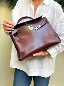 Highly Sought HERMES KELLY 32 Burgundy Box leather & Gold jewelry